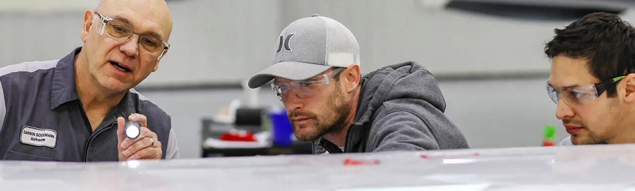 Duncan Aviation maintenance technicians working on a business aircraft
